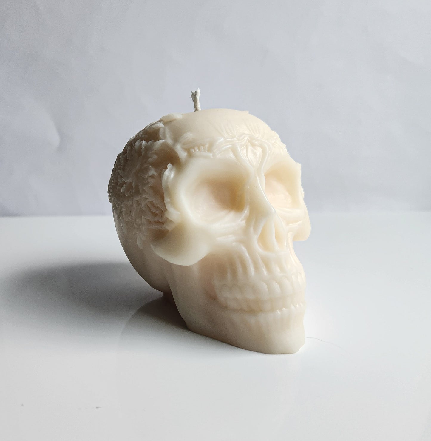 Floral Remains Skull Candle