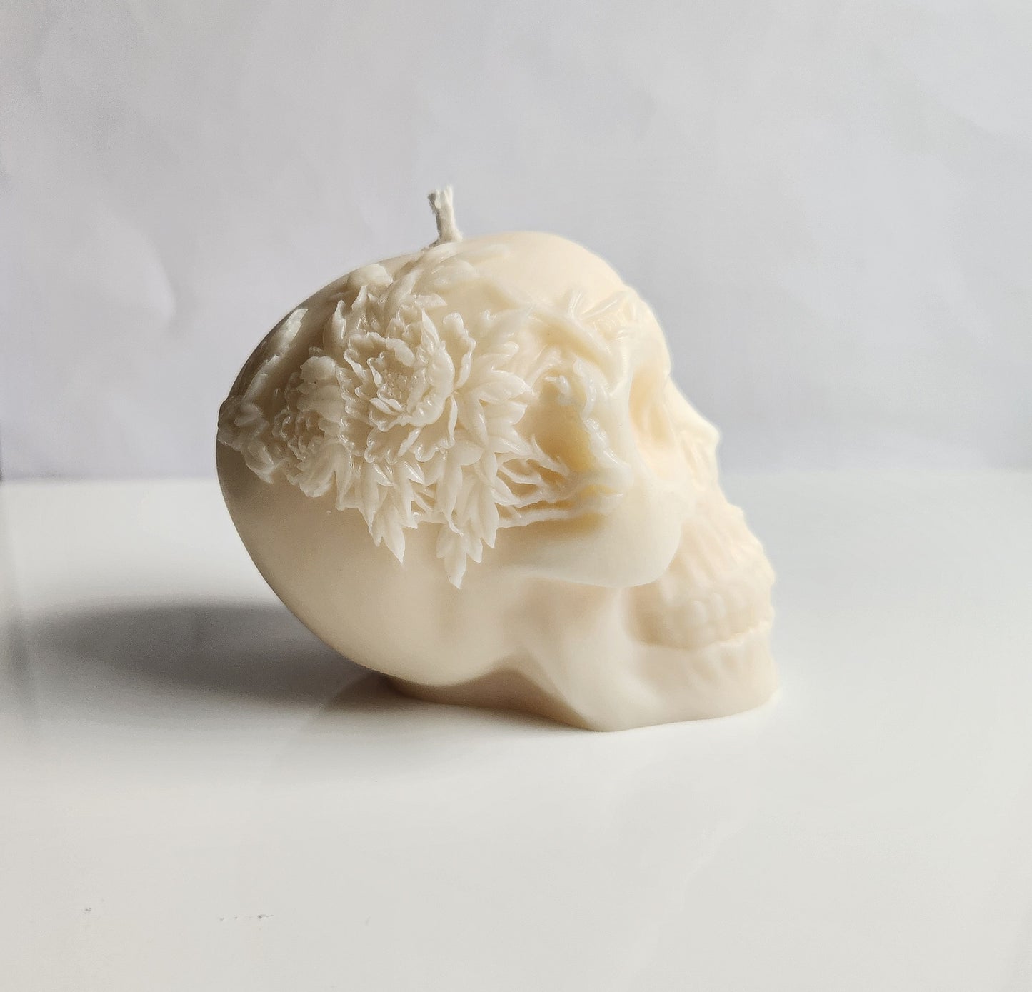 Floral Remains Skull Candle