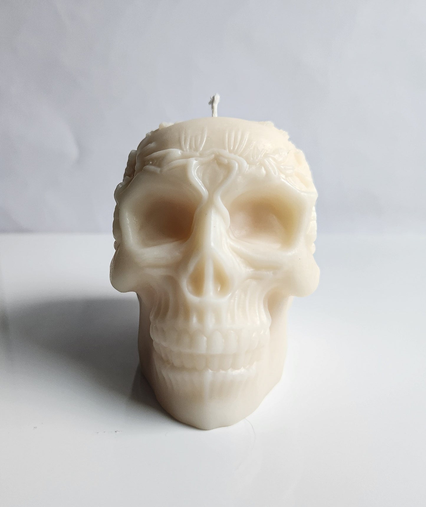 Floral Remains Skull Candle